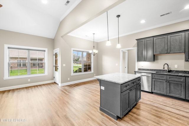 kitchen featuring a sink, visible vents, an inviting chandelier, and dishwasher
