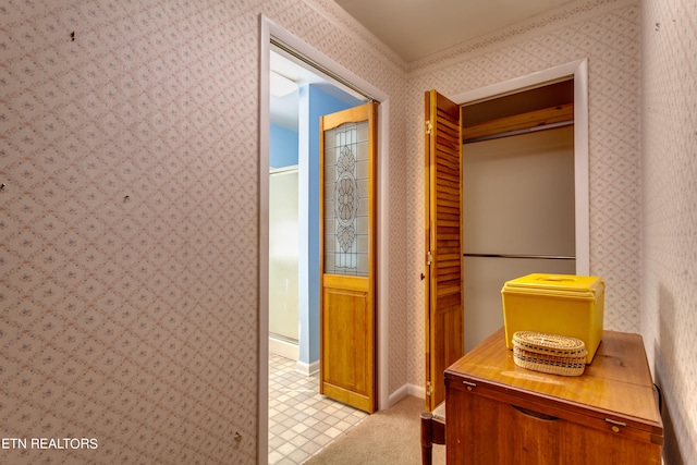 corridor featuring light tile patterned flooring