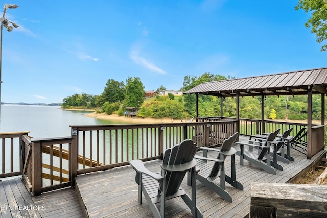 deck featuring a water view
