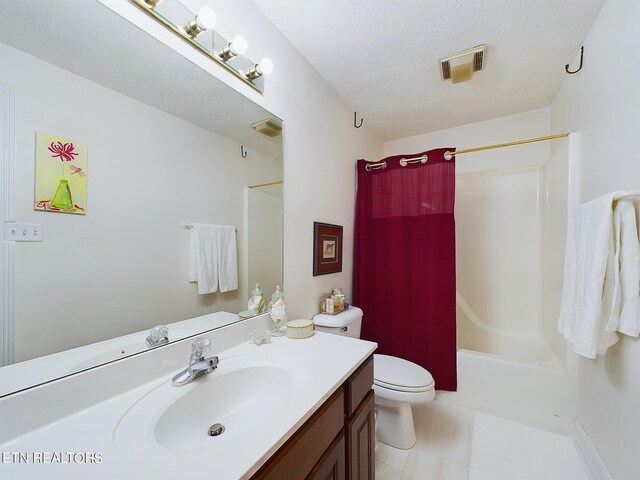 full bathroom with shower / tub combo, a textured ceiling, toilet, vanity, and tile patterned floors