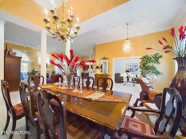 155 Lake Crest Dr, Lenoir City, TN 37772 - dining room featuring ornate columns, light tile patterned floors, crown molding, and a notable chandelier