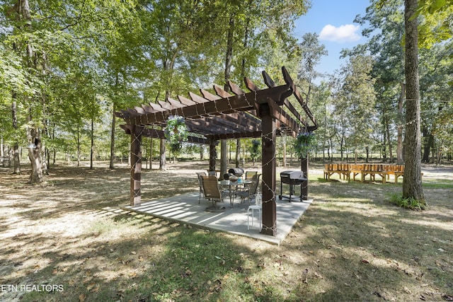 view of property's community featuring a pergola