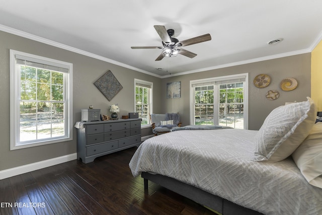 bedroom featuring ceiling fan, dark hardwood / wood-style floors, and ornamental molding