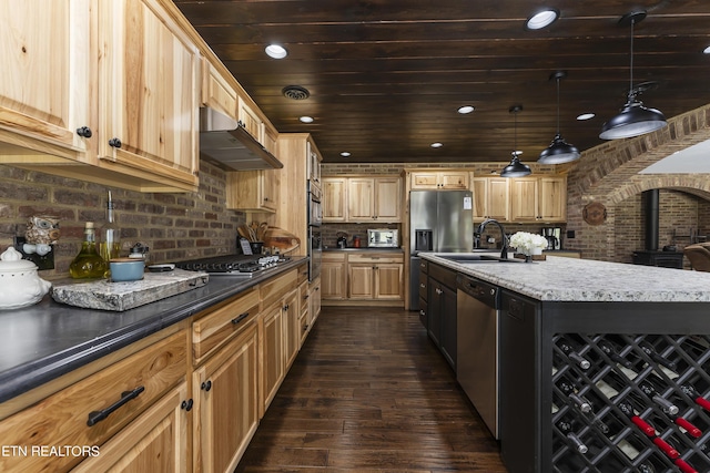 kitchen featuring dark hardwood / wood-style flooring, pendant lighting, a center island with sink, wood ceiling, and appliances with stainless steel finishes