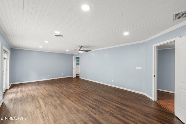 empty room with ceiling fan, a wealth of natural light, wood-type flooring, and ornamental molding