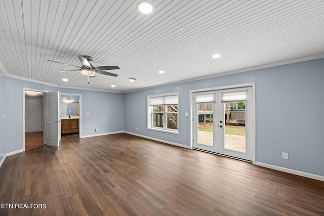 unfurnished living room featuring french doors, wood ceiling, dark wood-type flooring, ornamental molding, and ceiling fan