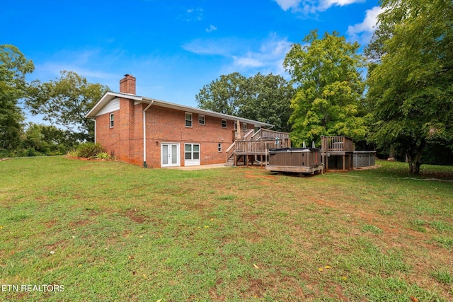 exterior space with a lawn and a deck