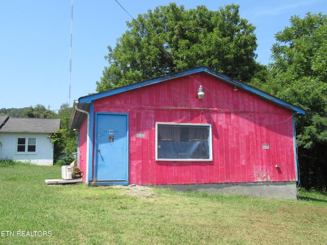 exterior space with a lawn