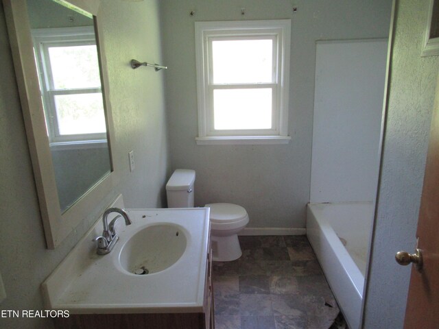 full bathroom featuring vanity, toilet, and independent shower and bath