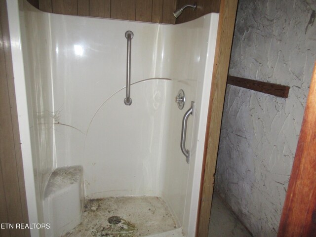 bathroom featuring walk in shower