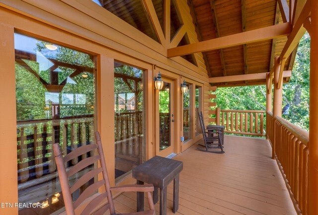 wooden terrace featuring french doors