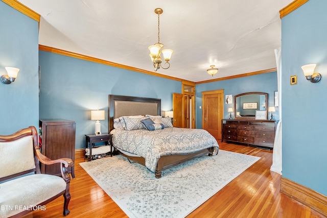 bedroom featuring crown molding, a chandelier, and hardwood / wood-style floors