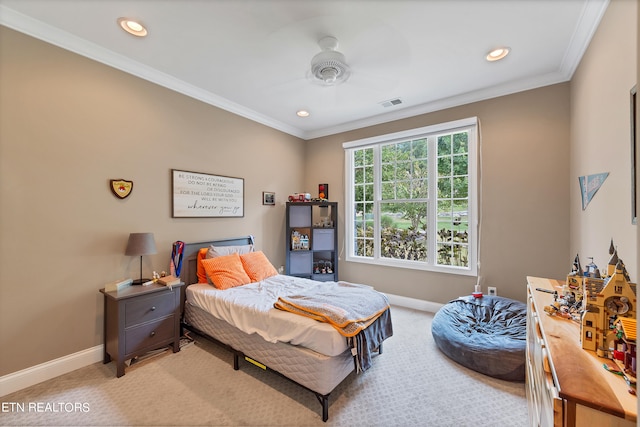 bedroom with multiple windows, ceiling fan, light colored carpet, and ornamental molding