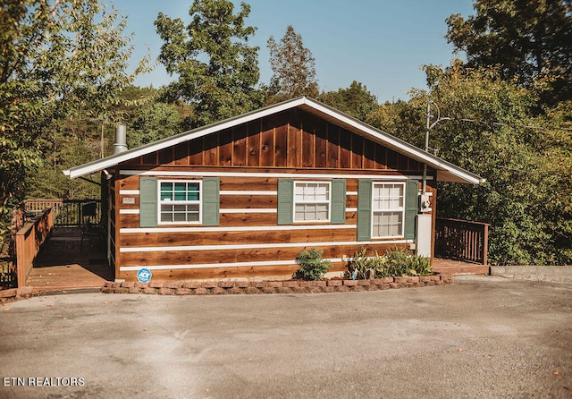 view of front of house with a deck