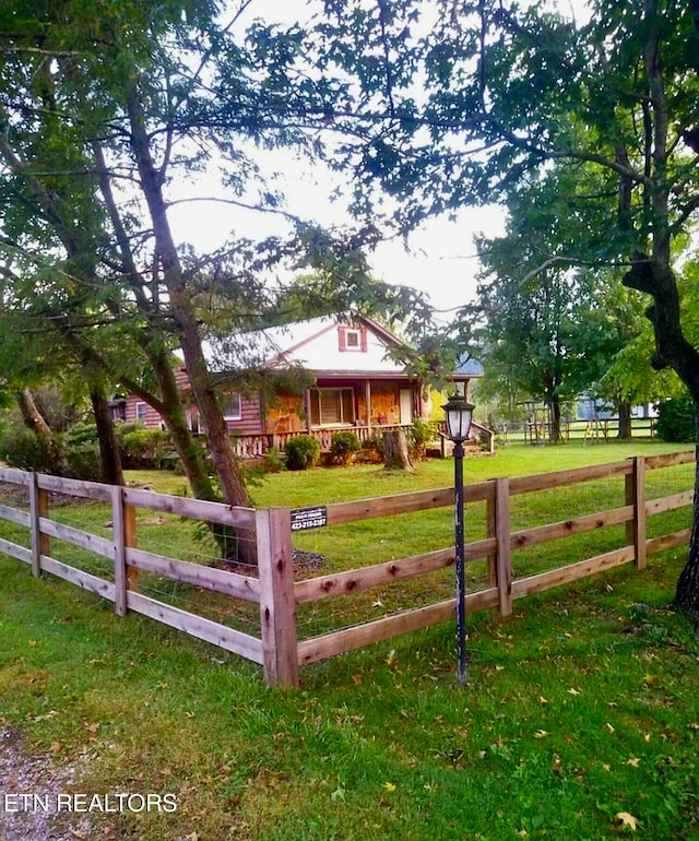 exterior space featuring a front yard