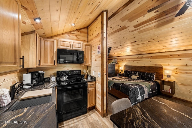 kitchen with ceiling fan, lofted ceiling, light hardwood / wood-style flooring, black appliances, and wooden ceiling