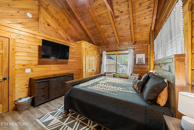 bedroom featuring wooden ceiling, vaulted ceiling with beams, wood walls, and light hardwood / wood-style flooring