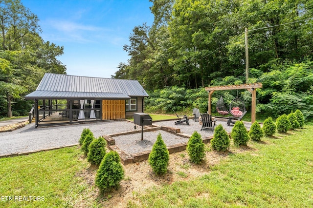 exterior space featuring an outbuilding