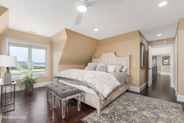 bedroom featuring ceiling fan and dark hardwood / wood-style floors