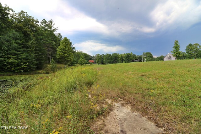 exterior space with a rural view