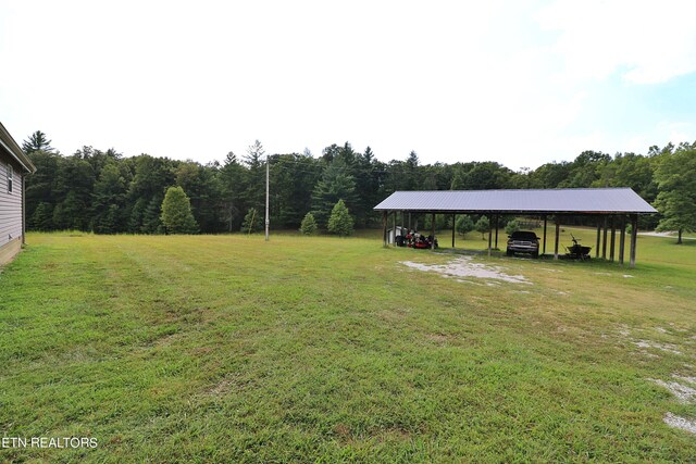 view of yard featuring a carport