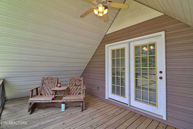 wooden terrace featuring ceiling fan