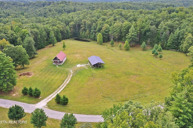 aerial view with a rural view and a view of trees