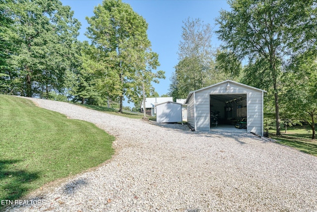 garage with a yard