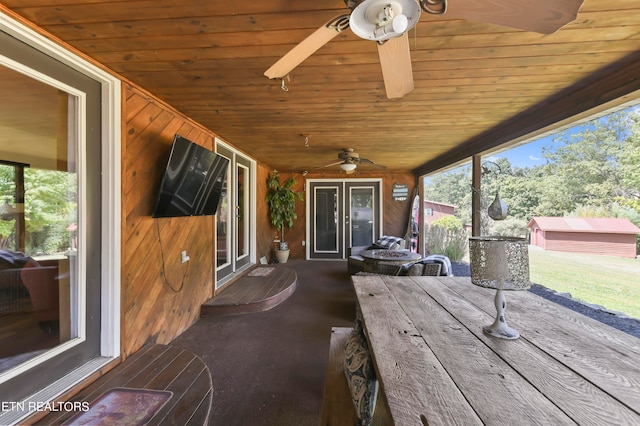 view of patio with french doors and ceiling fan