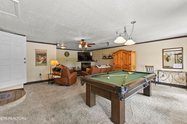 rec room with light carpet, billiards, ceiling fan, ornamental molding, and a textured ceiling