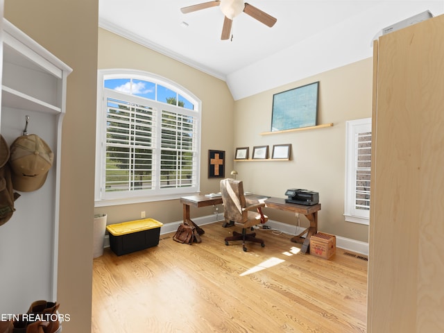 office area with lofted ceiling, light hardwood / wood-style flooring, ceiling fan, and ornamental molding