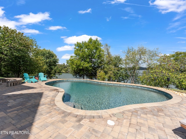 view of pool featuring a patio