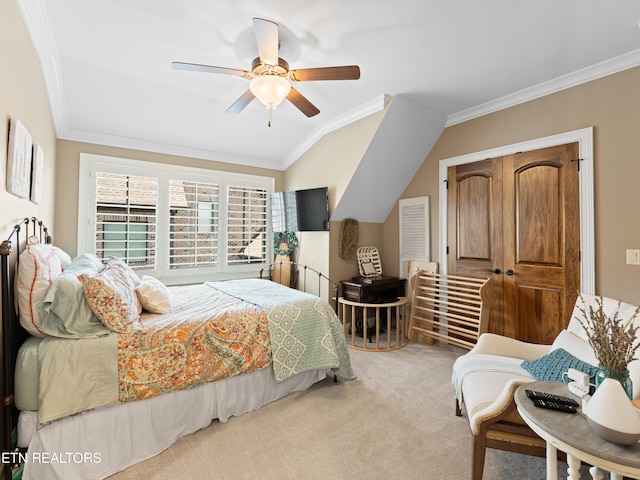 bedroom with lofted ceiling, carpet, ceiling fan, and ornamental molding