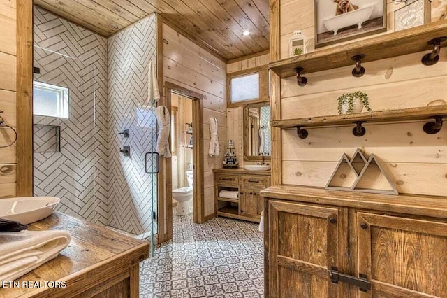 mudroom featuring wood ceiling, wood walls, and sink