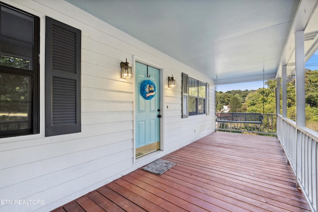 wooden deck featuring a porch