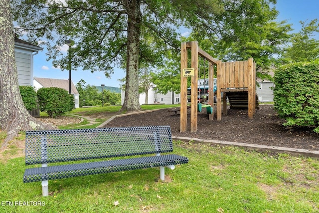 view of play area with a yard