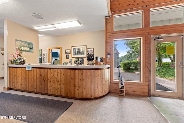 reception area with ceiling fan