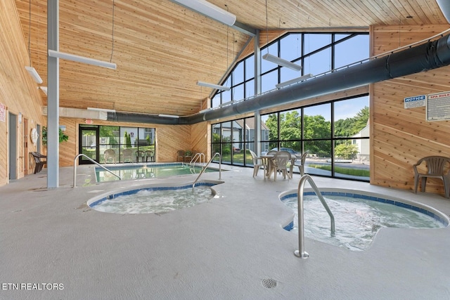 view of pool featuring an indoor hot tub