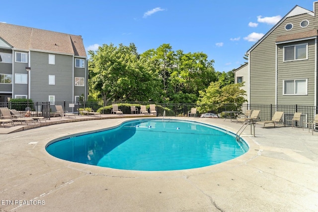 view of pool featuring a patio