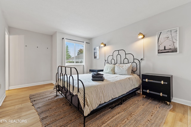 bedroom featuring light hardwood / wood-style flooring