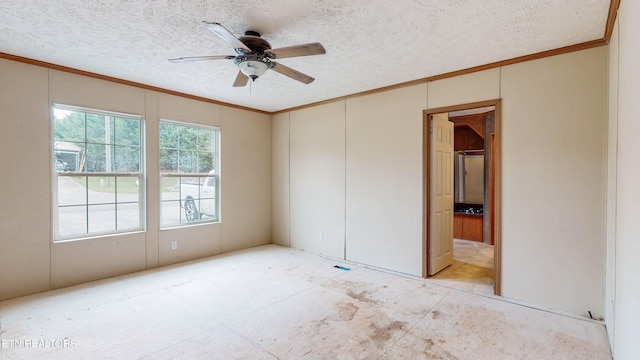 unfurnished bedroom with ornamental molding, a textured ceiling, and ceiling fan