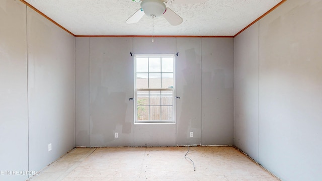 unfurnished room featuring a textured ceiling, crown molding, and ceiling fan