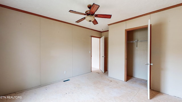 unfurnished bedroom featuring ceiling fan and ornamental molding