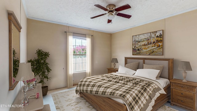 bedroom with ceiling fan, crown molding, and a textured ceiling