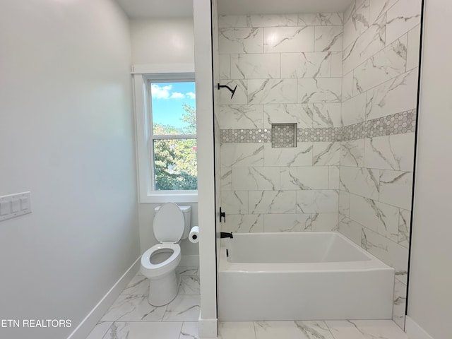 full bath featuring toilet, marble finish floor, baseboards, and shower / bathtub combination