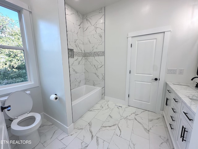 bathroom with shower / bathtub combination, toilet, vanity, baseboards, and marble finish floor