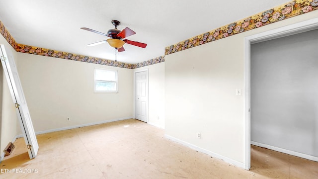 unfurnished bedroom featuring ceiling fan