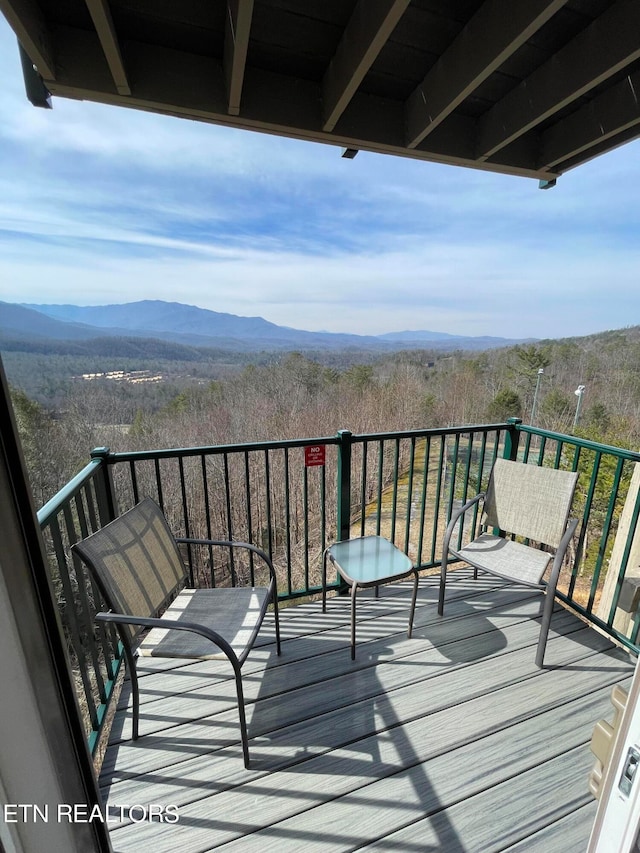 balcony featuring a mountain view