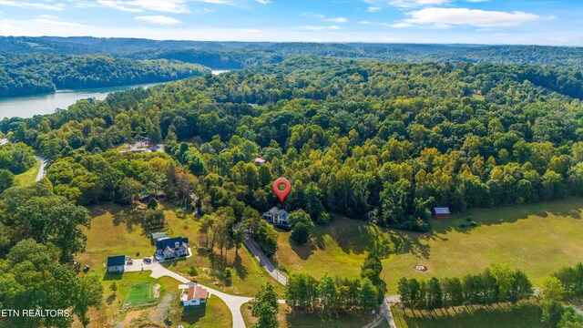 bird's eye view with a water view