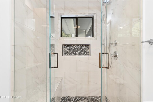 bathroom featuring walk in shower